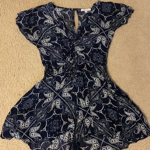Loose fitting royal blue romper with white detailing
